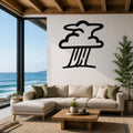 Black metal storm cloud wall art with raindrop cutouts, mounted on a white living room wall above a beige sectional sofa.