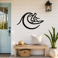 Black metal surfer wall art with a minimalist wave silhouette, mounted on a white shiplap wall above a wooden bench in a porch entryway.