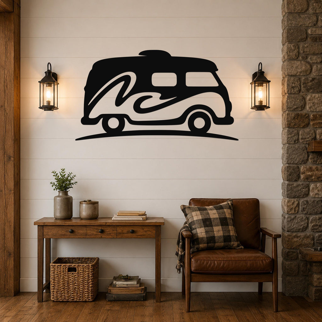 Black metal wall art silhouette of a vintage camper van with wave design, mounted on a shiplap wall above a wooden console table in a living room.
