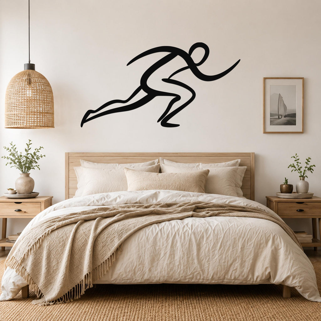 Black metal runner wall art with dynamic motion lines, mounted above a bed in a neutral bedroom.