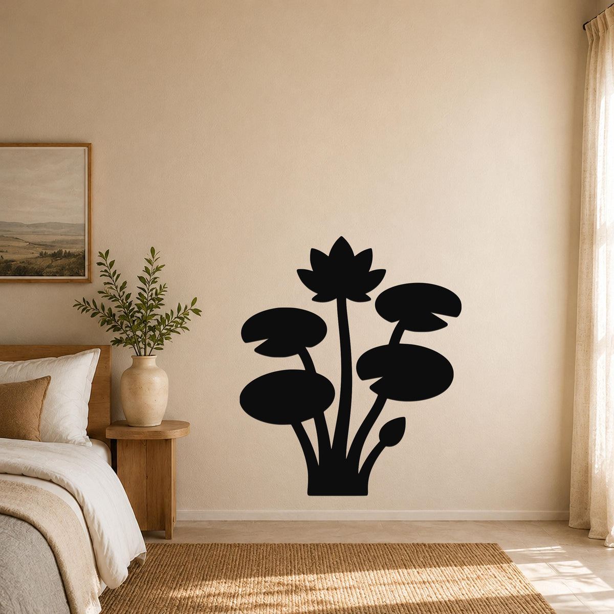 Black metal lotus and water lily wall art silhouette mounted on a beige bedroom wall above a woven rug.