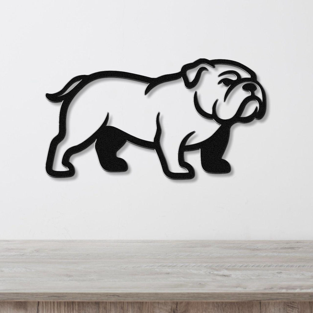 Black metal bulldog wall art silhouette with cutout details, mounted on a white wall above a light wood counter.