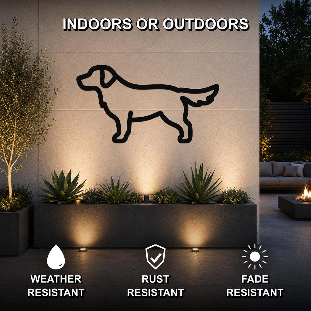 Black metal dog silhouette wall art mounted on an outdoor wall above a planter, with text indicating it is weather, rust, and fade resistant for indoor or outdoor use.