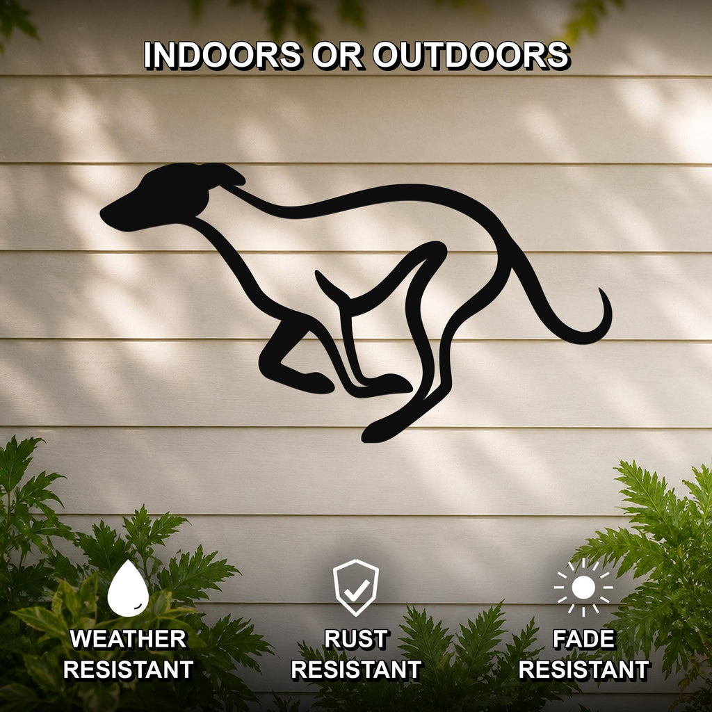 Black metal greyhound wall art silhouette with motion-line cutouts, mounted on a light-colored outdoor wall with greenery below.