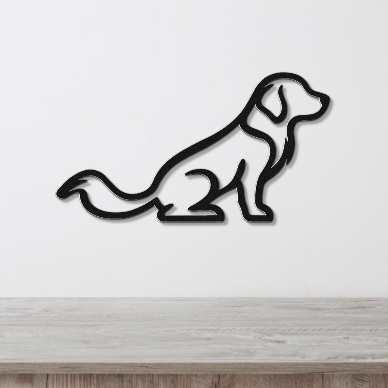 Black metal wall art of a sitting dog silhouette with a long tail, mounted on a white wall above a light wood surface.