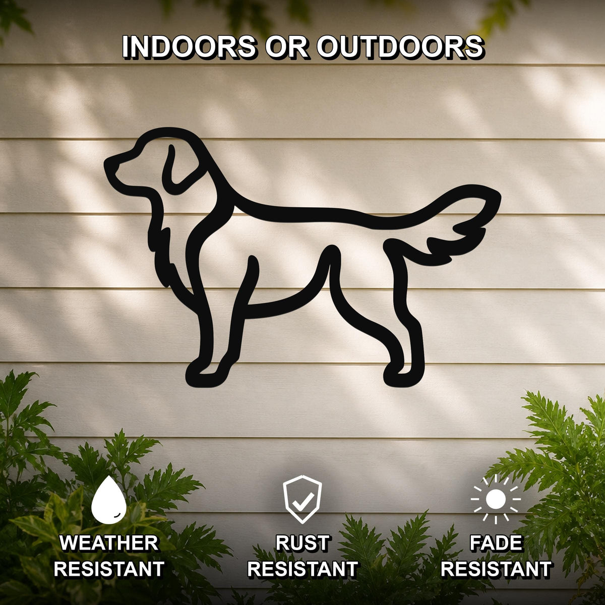 Black metal retriever silhouette wall art mounted on a beige outdoor wall, weather resistant, rust resistant, and fade resistant, with green foliage at the base.