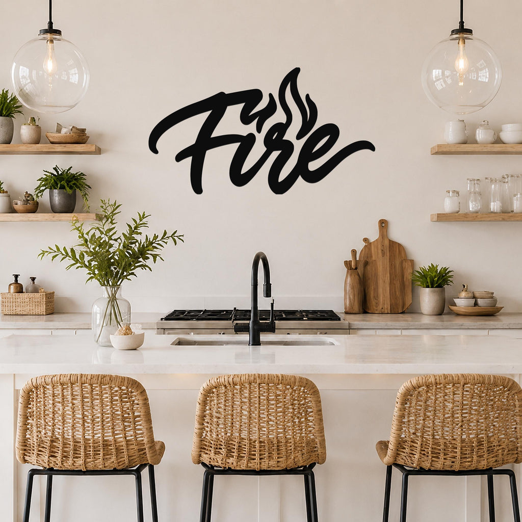 Black metal wall art with the word "Fire" in cursive script and flame cutouts, mounted on a kitchen wall above a counter.
