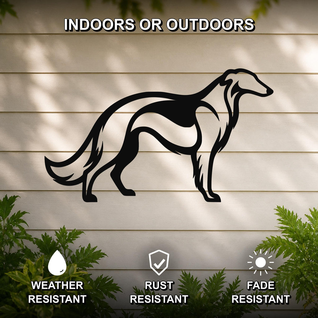 Black metal Borzoi dog wall art silhouette mounted on a beige outdoor wall, with green plants at the base and text indicating it is weather, rust, and fade resistant.