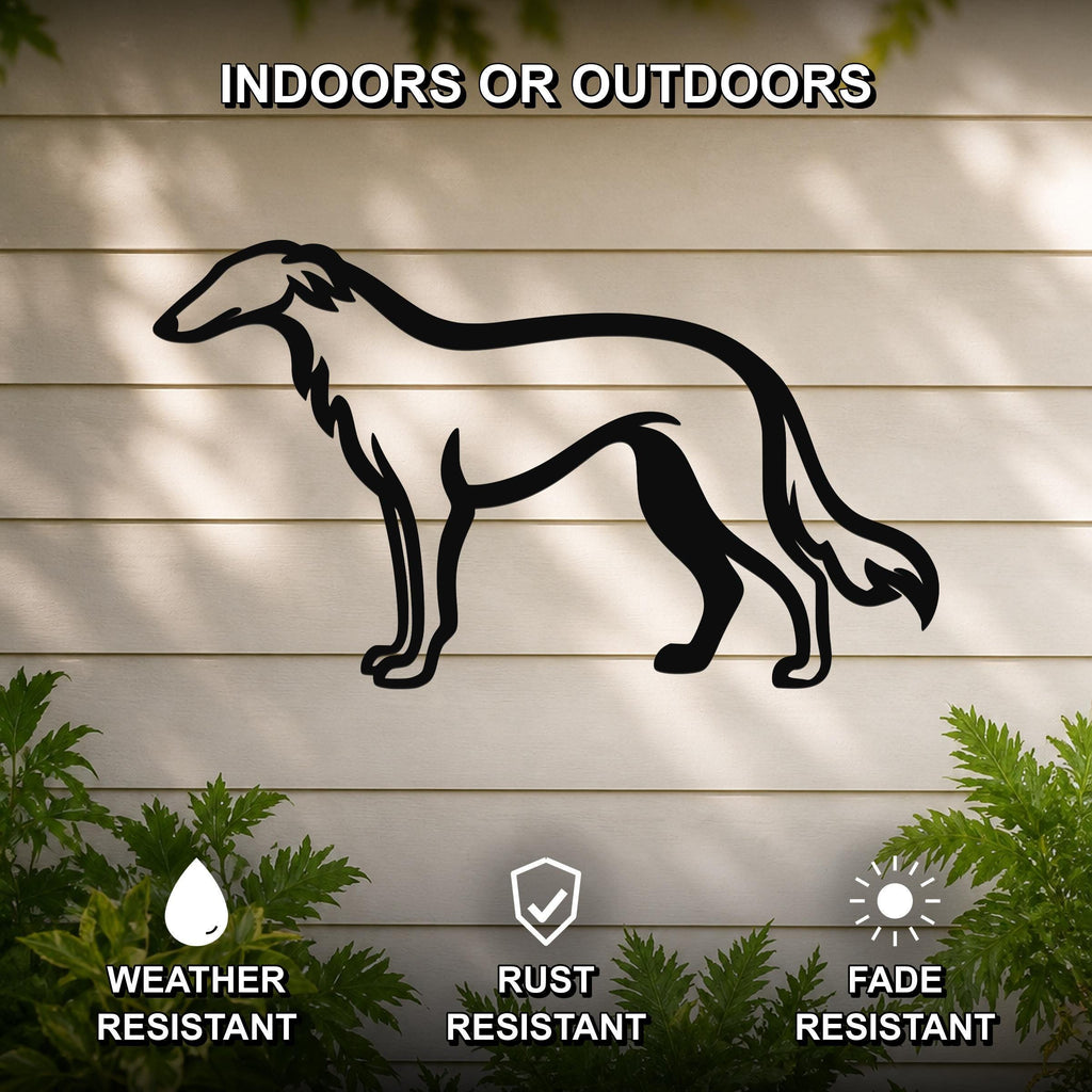 Black metal Borzoi dog wall art silhouette mounted on a beige outdoor wall, weather resistant, rust resistant, and fade resistant, with green plants visible at the bottom.