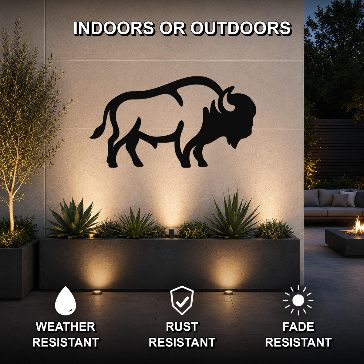 Black metal bison silhouette wall art mounted on an outdoor wall above a planter, with text indicating it is weather, rust, and fade resistant.