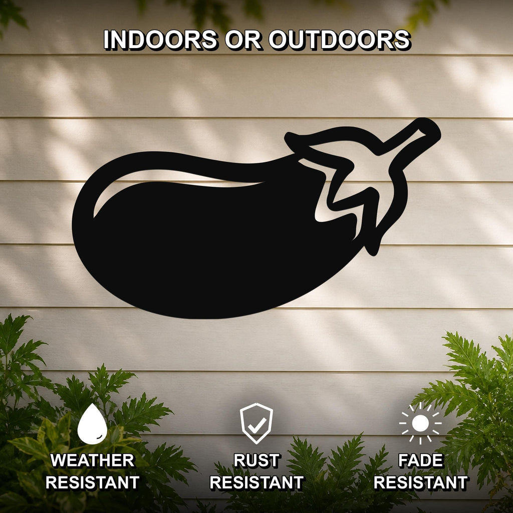 Black metal eggplant wall art silhouette mounted on a light-colored outdoor wall, with green plants visible below and text indicating it is weather, rust, and fade resistant.