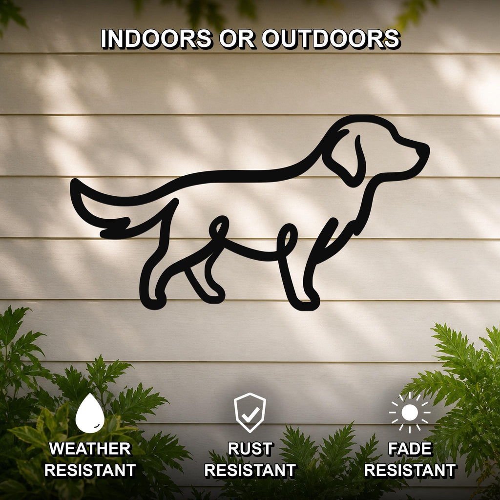 Black metal dog silhouette wall art mounted on a light-colored outdoor wall, with green plants at the base and text indicating it is weather, rust, and fade resistant.