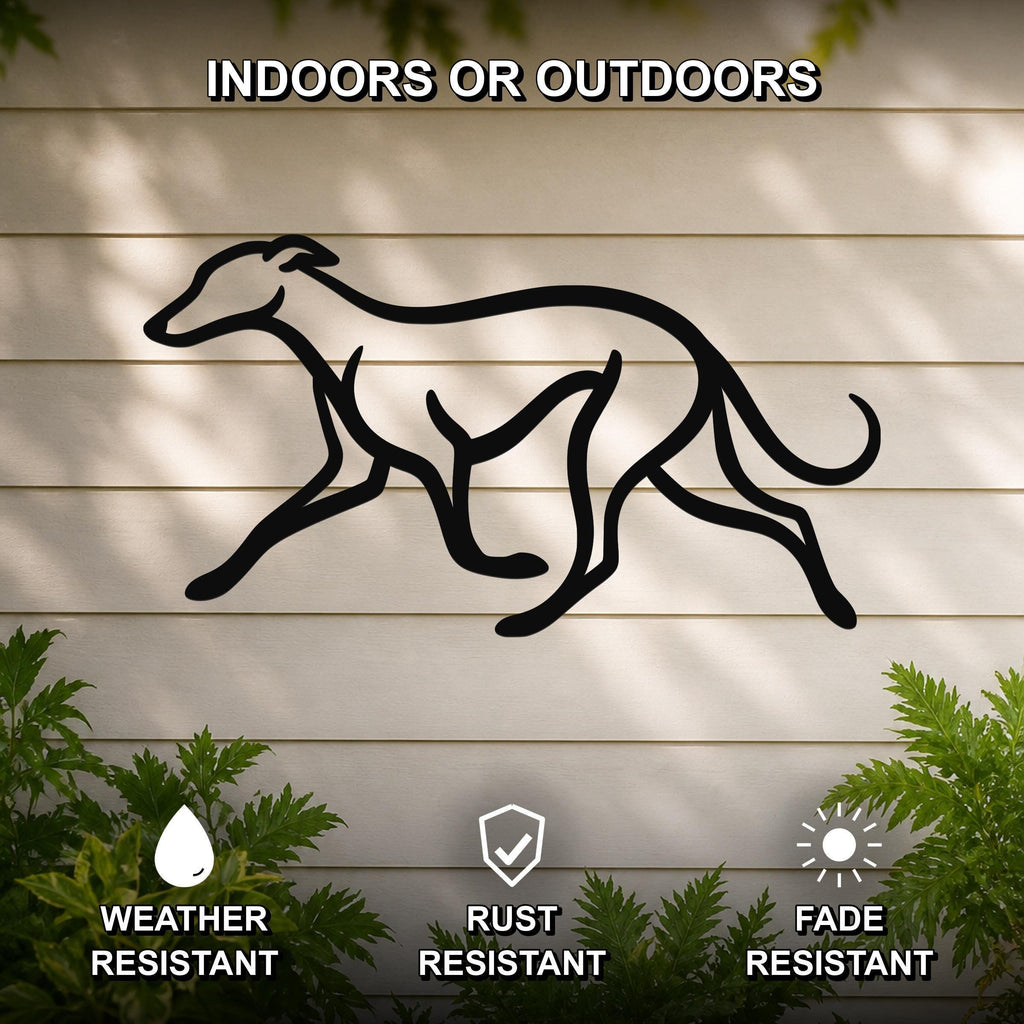 Black metal greyhound silhouette wall art with motion-line cutouts, mounted on a light-colored outdoor wall with greenery below.