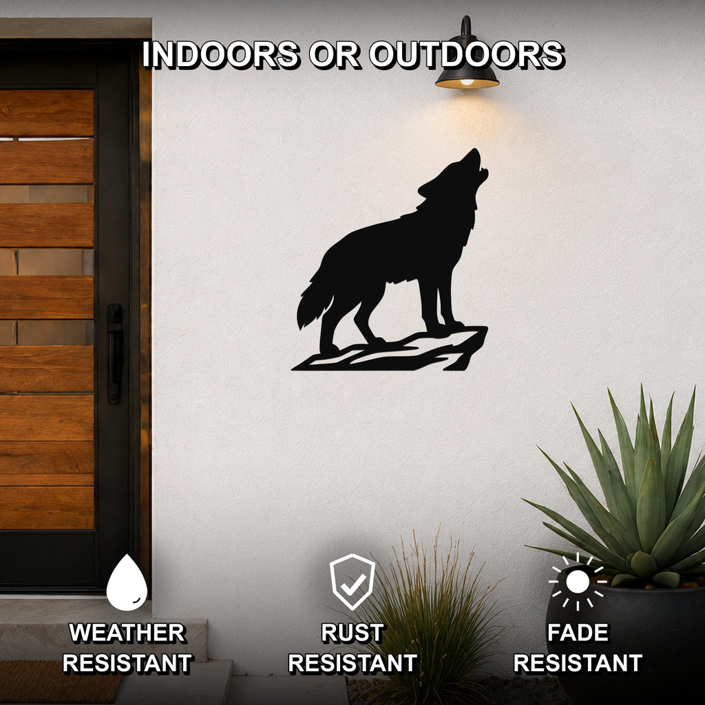 Black metal coyote wall art silhouette howling on a rock, mounted on an outdoor wall beside a door, weather, rust, and fade resistant.