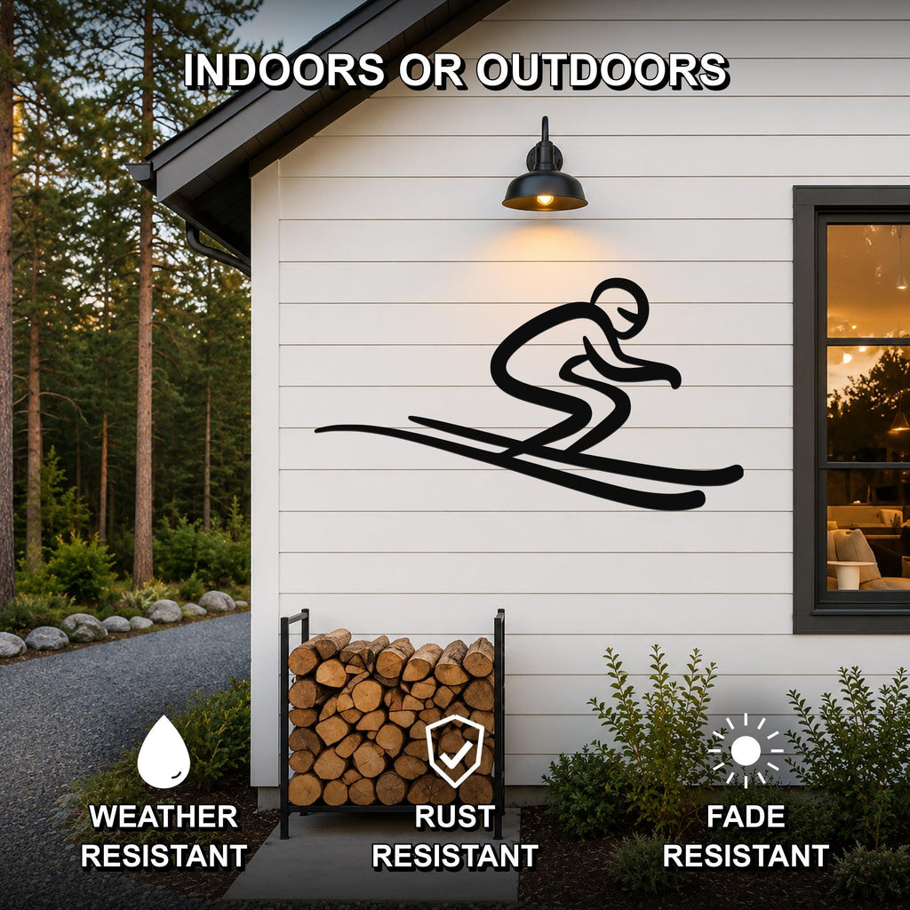 Black metal skier wall art with motion-line cutouts, mounted on a white exterior wall above a firewood rack, weather and fade resistant.