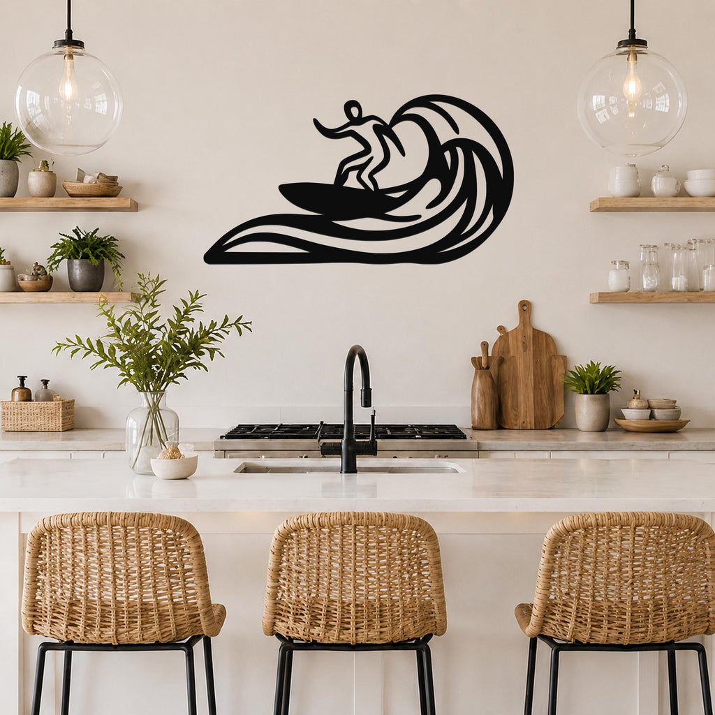 Black metal surfer wall art with wave cutouts, mounted above a kitchen counter in a bright, modern kitchen.