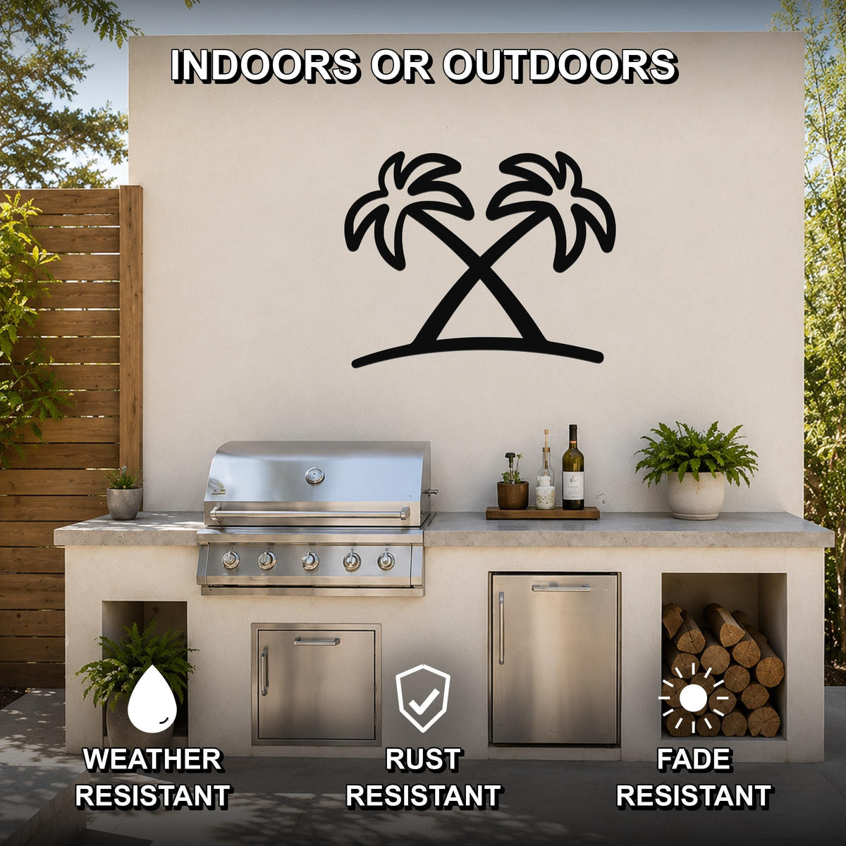 Black metal palm tree wall art silhouette mounted on an outdoor kitchen wall above a stainless steel grill, with visible weather, rust, and fade resistance icons.