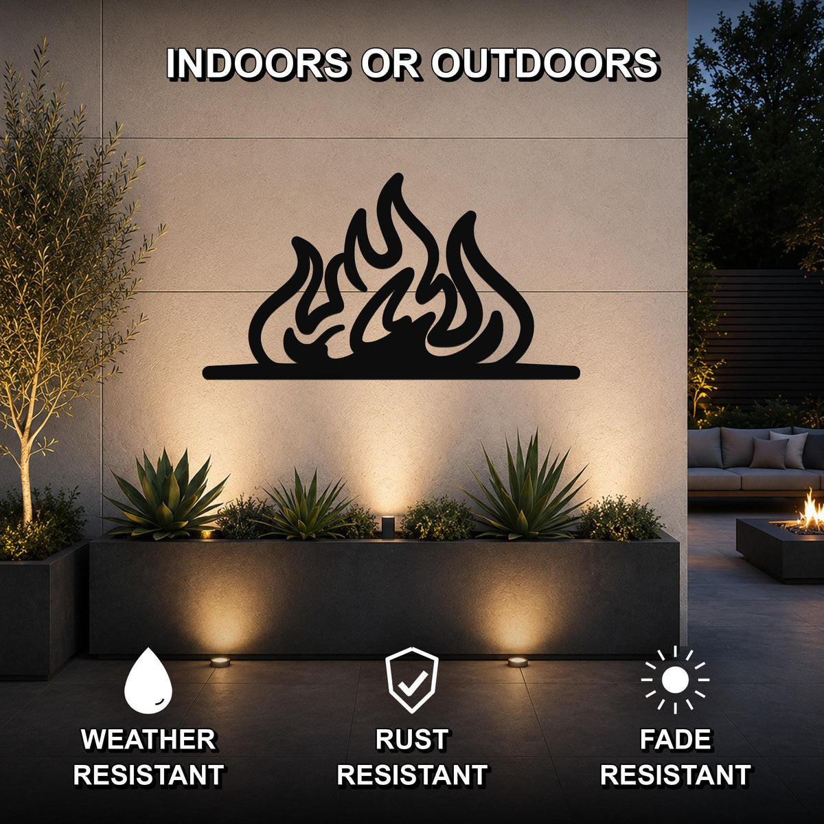 Black metal flame silhouette wall art mounted on an outdoor wall above a planter, with text indicating it is weather, rust, and fade resistant for indoor or outdoor use.