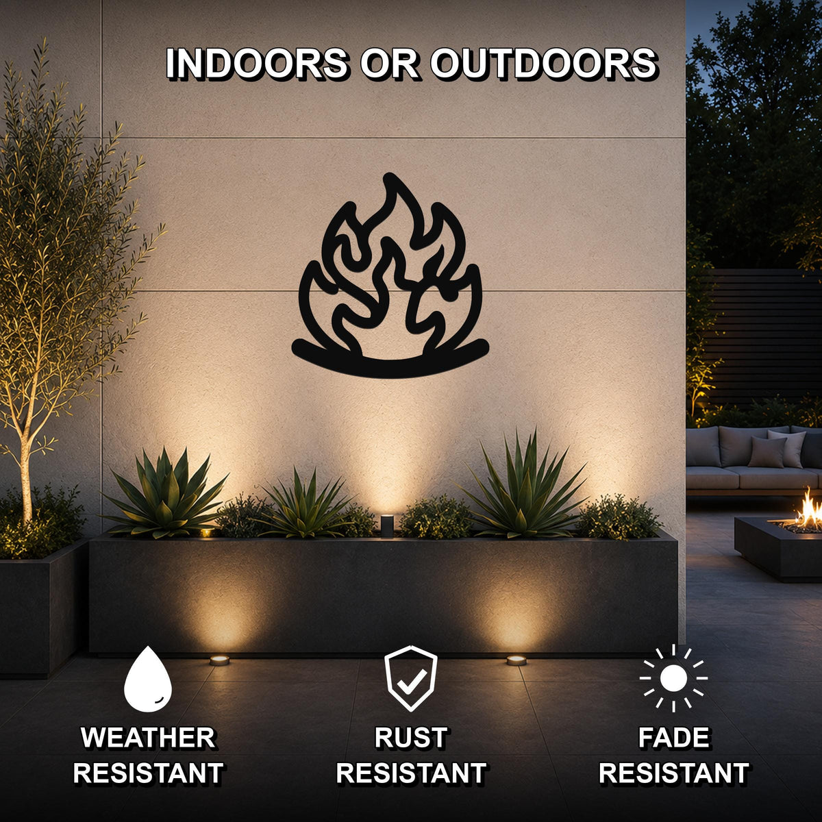 Black metal flame wall art with fluid motion cutouts, mounted on an outdoor wall above a planter in a modern patio setting.