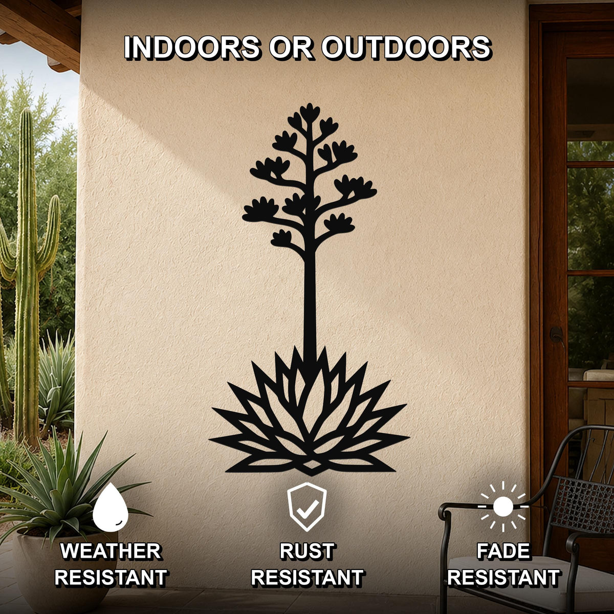 Black metal agave wall art with blooming flower and spiky leaf cutouts, mounted on an outdoor patio wall.