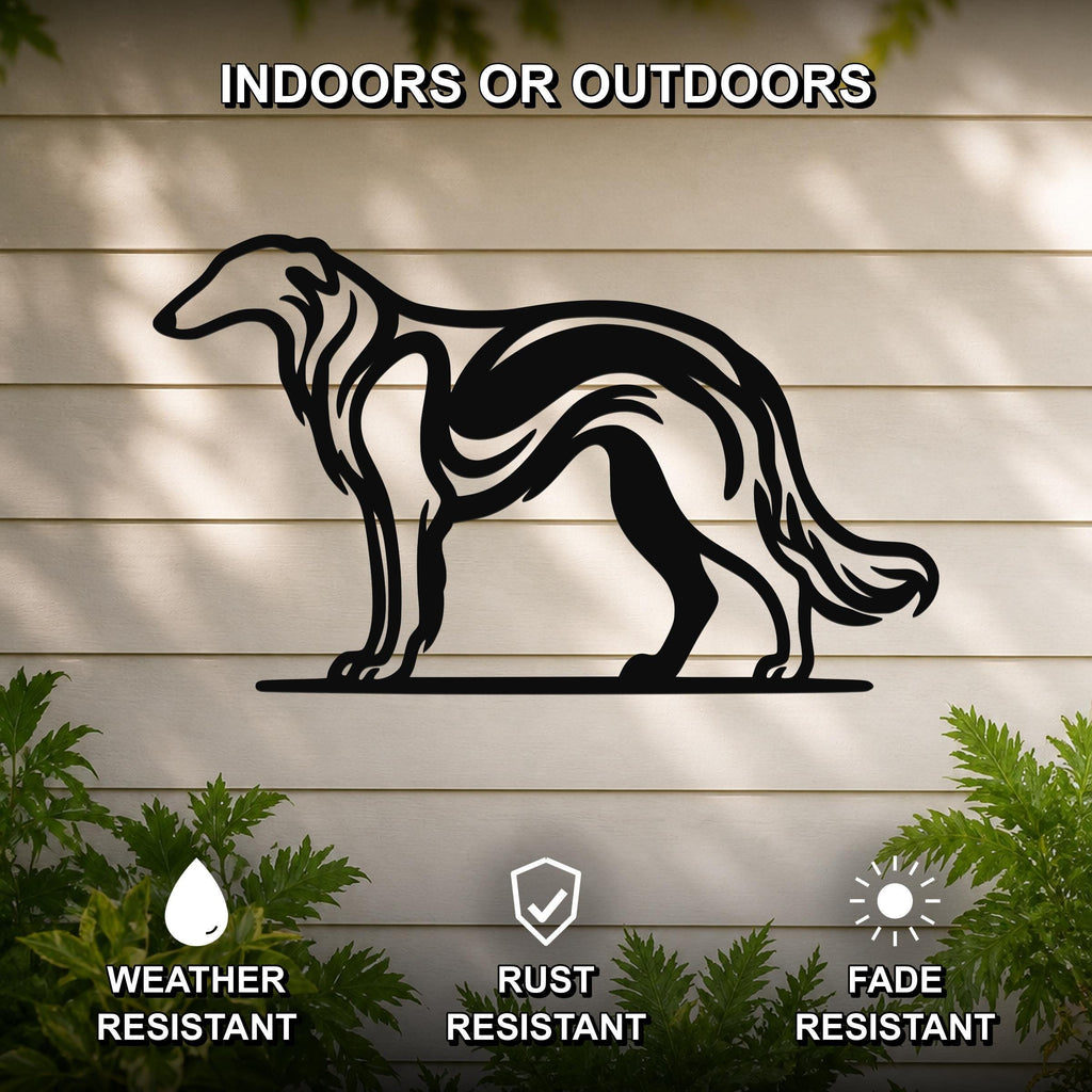 Black metal Borzoi dog wall art silhouette with internal motion-line cutouts, mounted on a light-colored outdoor wall with greenery below.