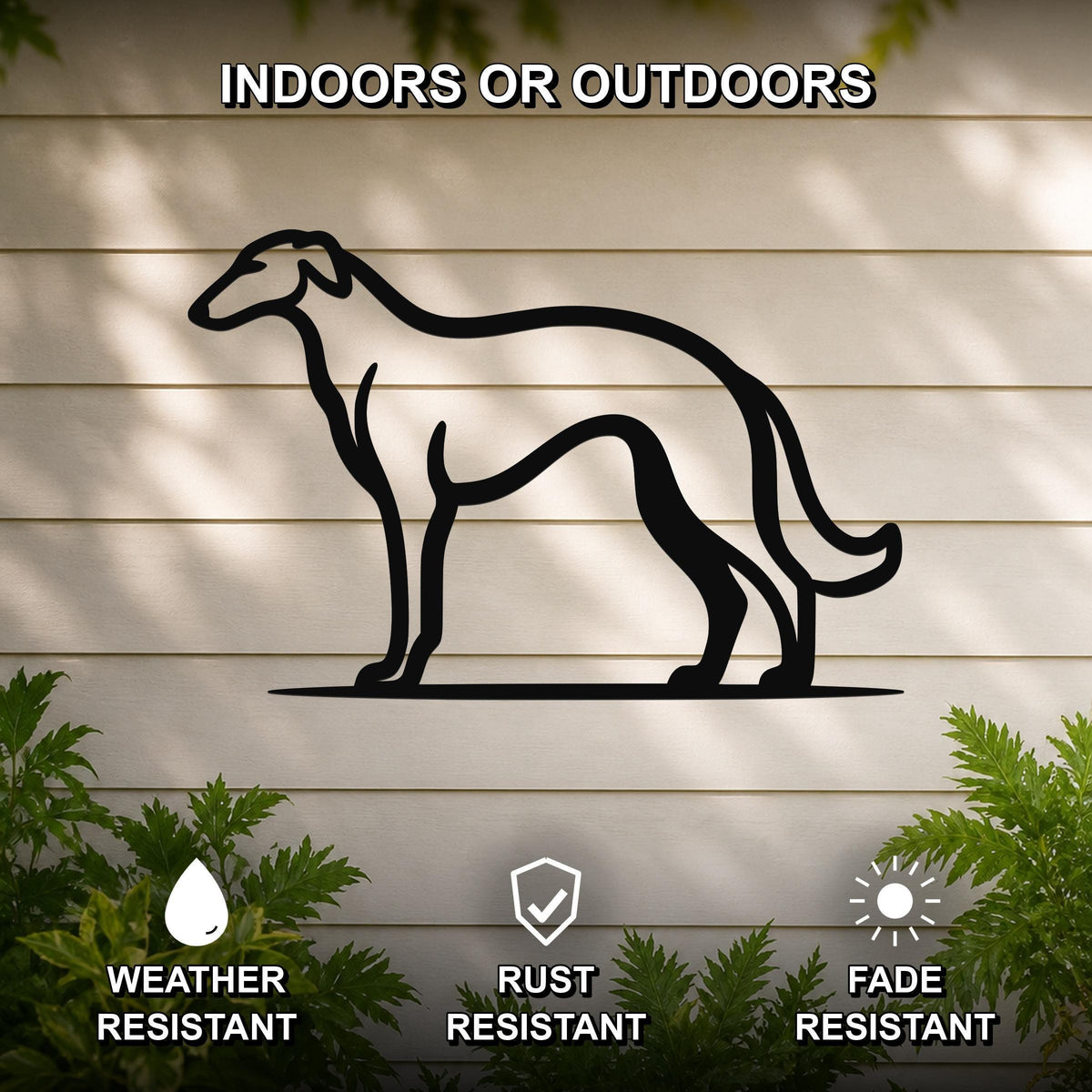 Black metal Borzoi dog silhouette wall art mounted on a light-colored outdoor wall, with green plants at the base and text indicating it is weather, rust, and fade resistant.