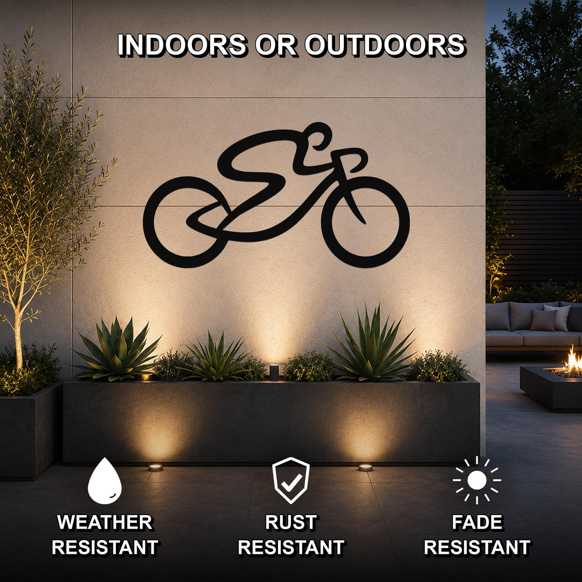 Black metal bicycle wall art with a bold silhouette design, mounted on an outdoor wall above a planter in a modern patio setting.