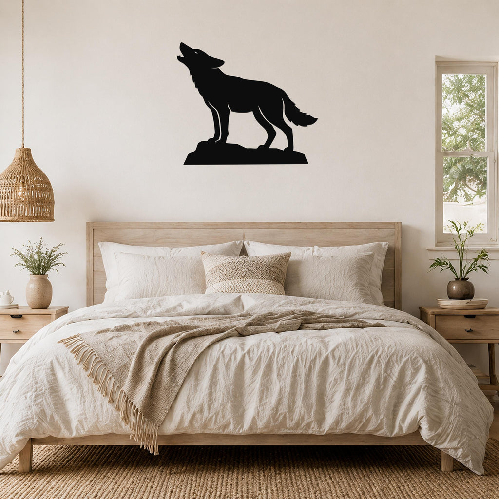 Black metal coyote wall art in a howling silhouette, mounted above a wooden bed in a neutral bedroom.