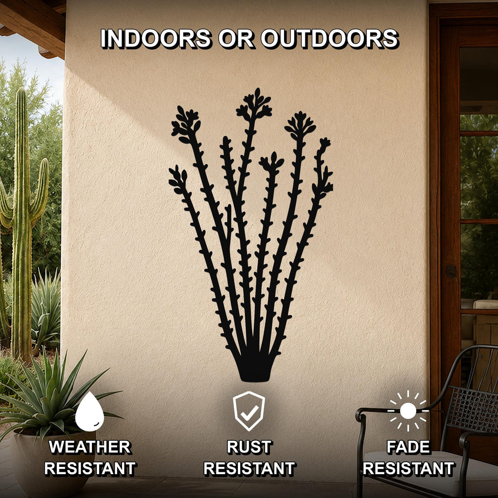Black metal ocotillo wall art with detailed branch and flower cutouts, mounted on an outdoor patio wall above a potted plant.