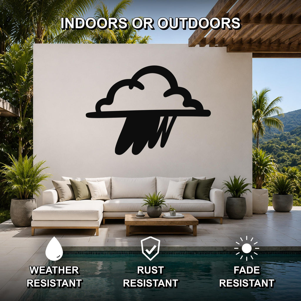 Black metal rain cloud wall art with raindrop cutouts, mounted on a white outdoor wall above a sofa in a patio living area.