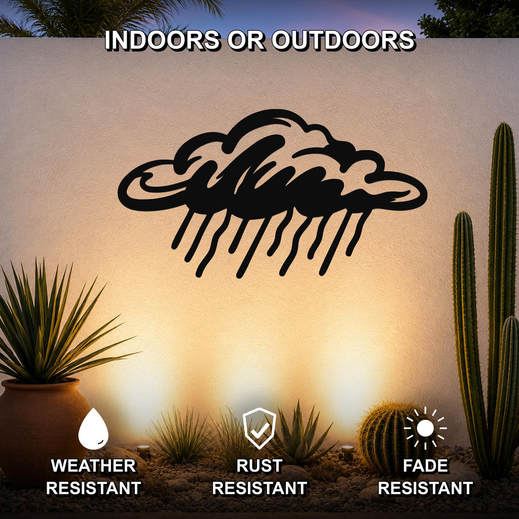 Black metal rain cloud wall art with raindrop cutouts, mounted on an outdoor wall above a desert garden with cacti and potted plants.