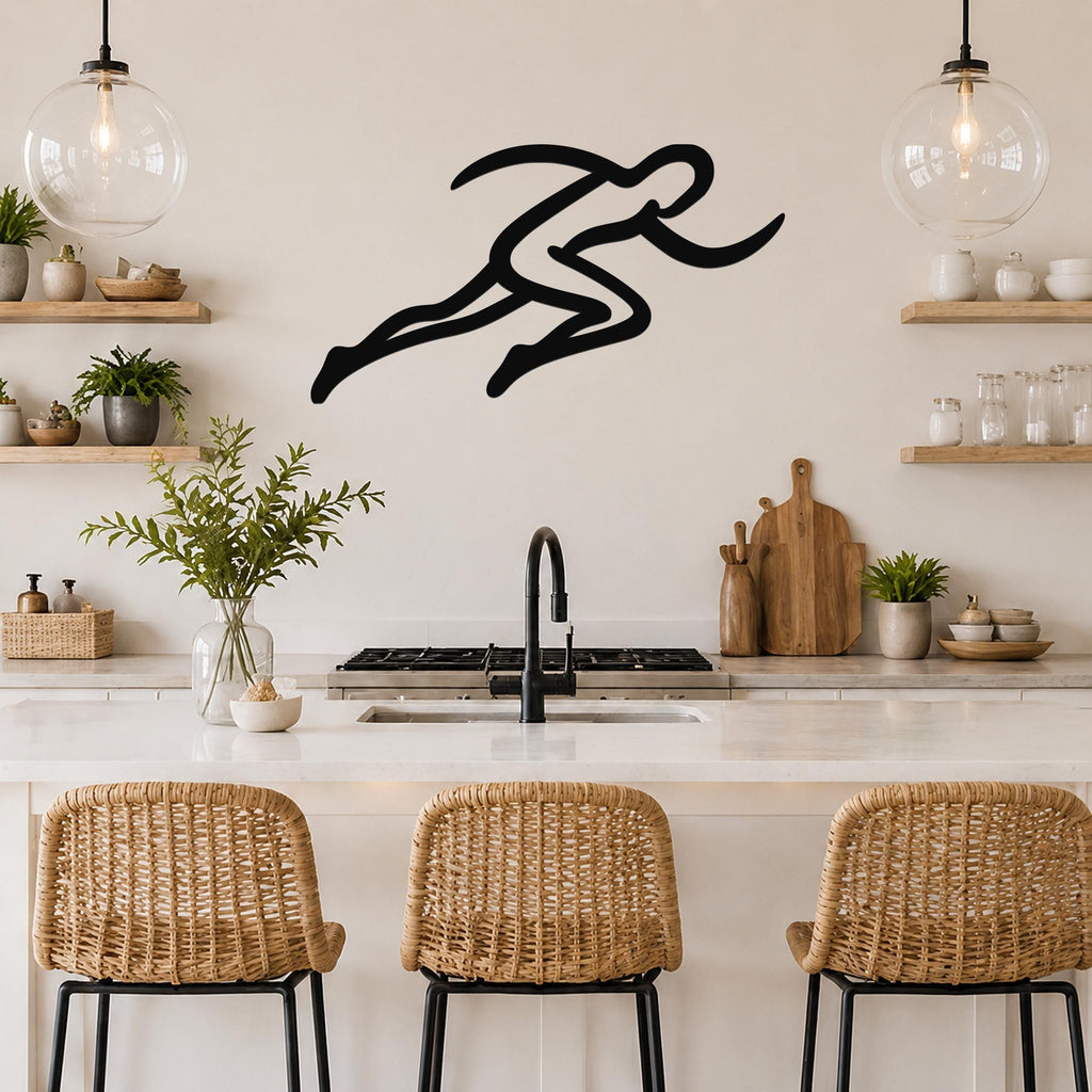 Black metal runner wall art with motion-line cutouts, mounted above a kitchen counter in a modern kitchen.