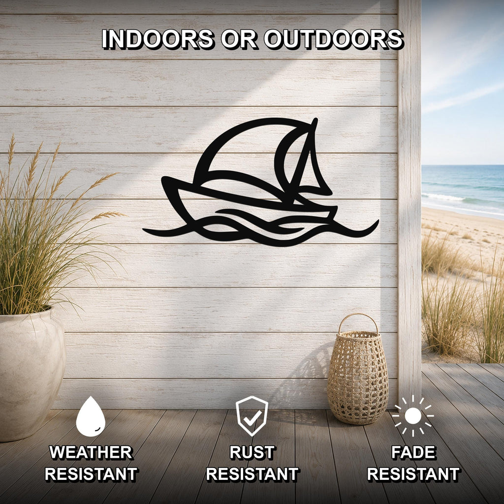 Black metal sailboat wall art with wave cutouts, mounted on a light wood plank wall above a deck, shown with weather, rust, and fade resistant icons.