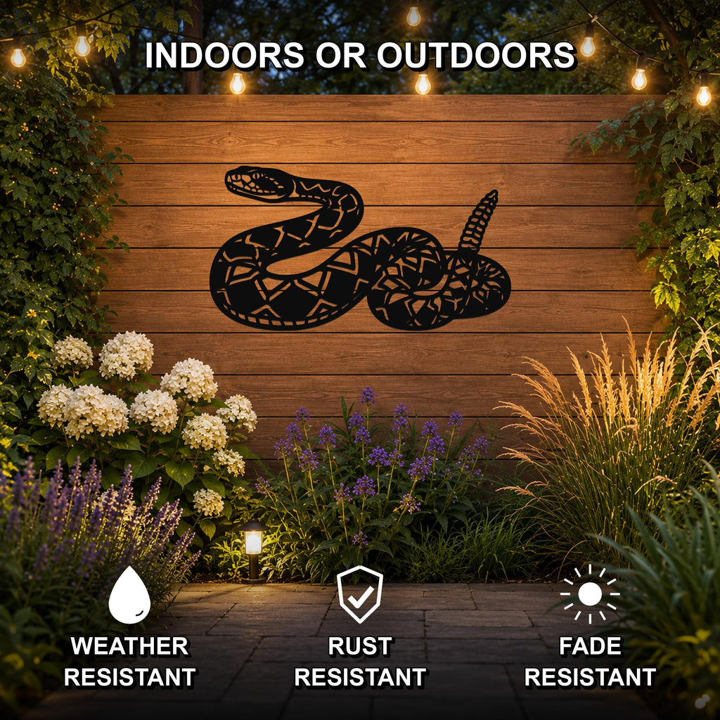 Black metal snake wall art with intricate cutout patterns, mounted on a wooden outdoor wall surrounded by plants and string lights.
