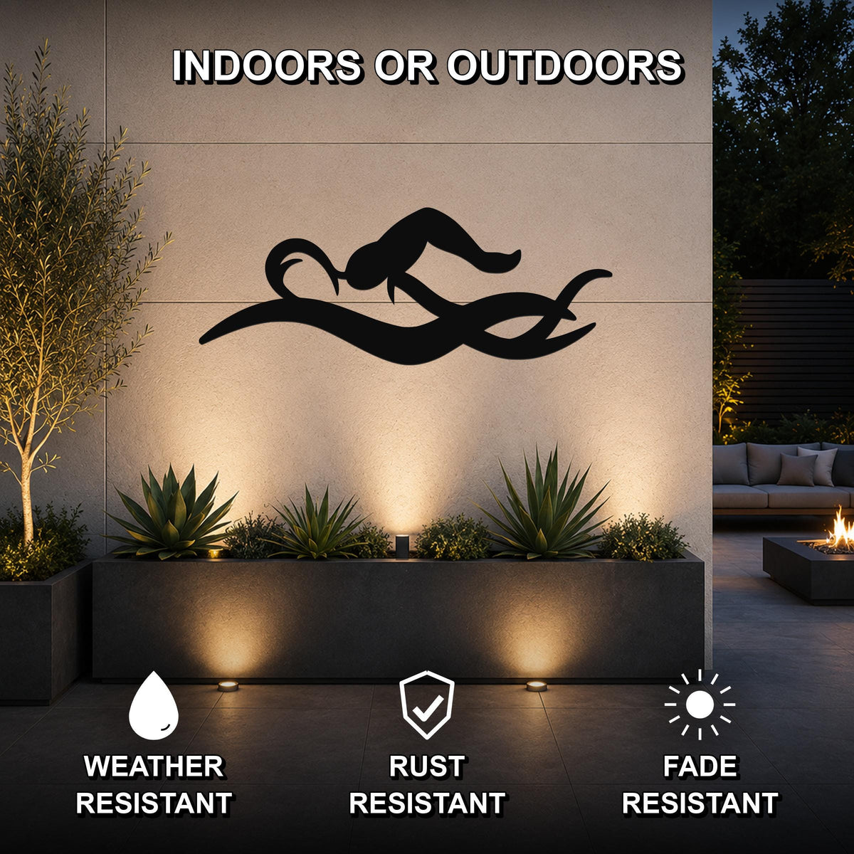 Black metal swimmer wall art with fluid motion cutouts, mounted on an outdoor wall above a planter in a modern patio setting.