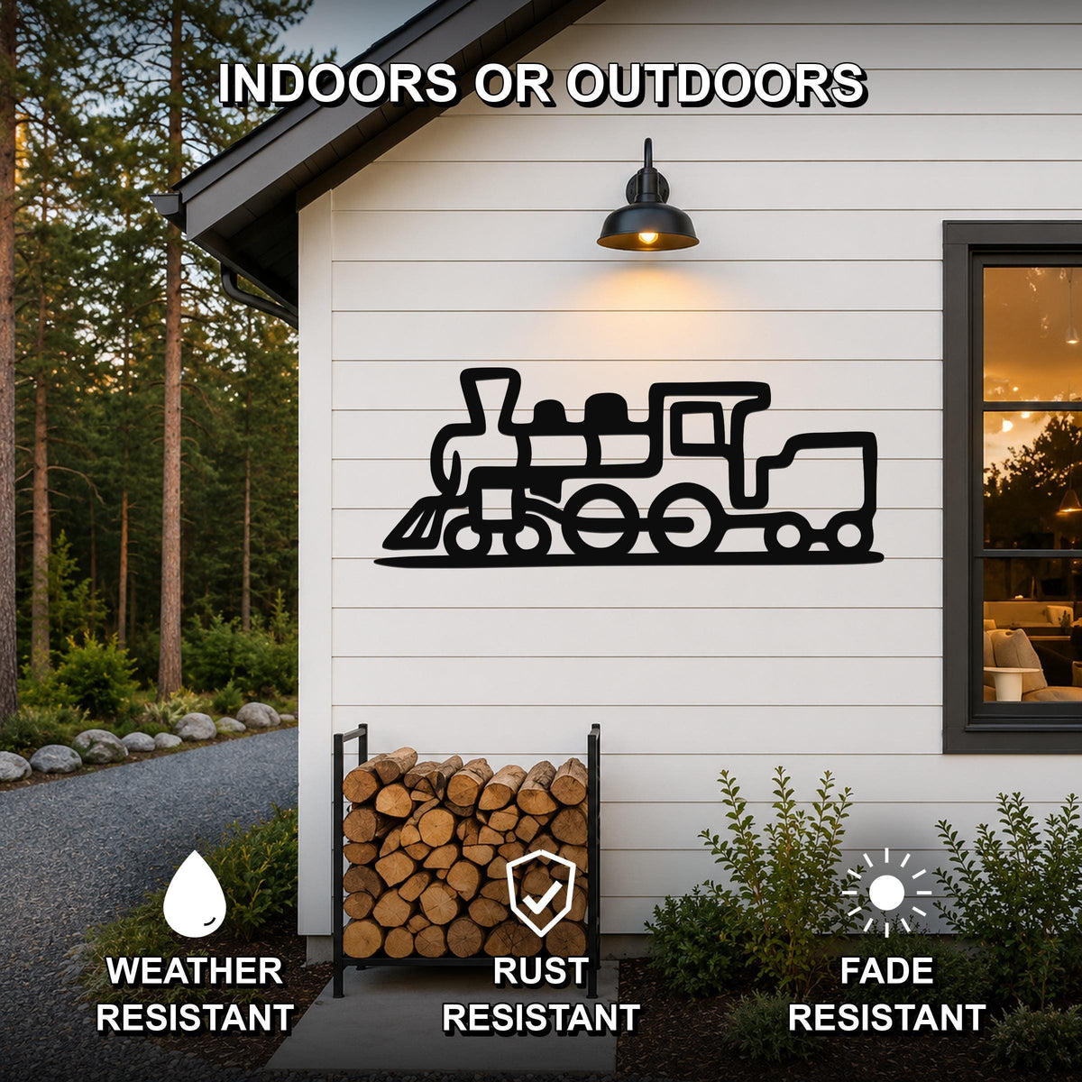 Black metal train silhouette wall art mounted on a white exterior wall above a firewood rack, with text indicating it is weather, rust, and fade resistant for indoor or outdoor use.