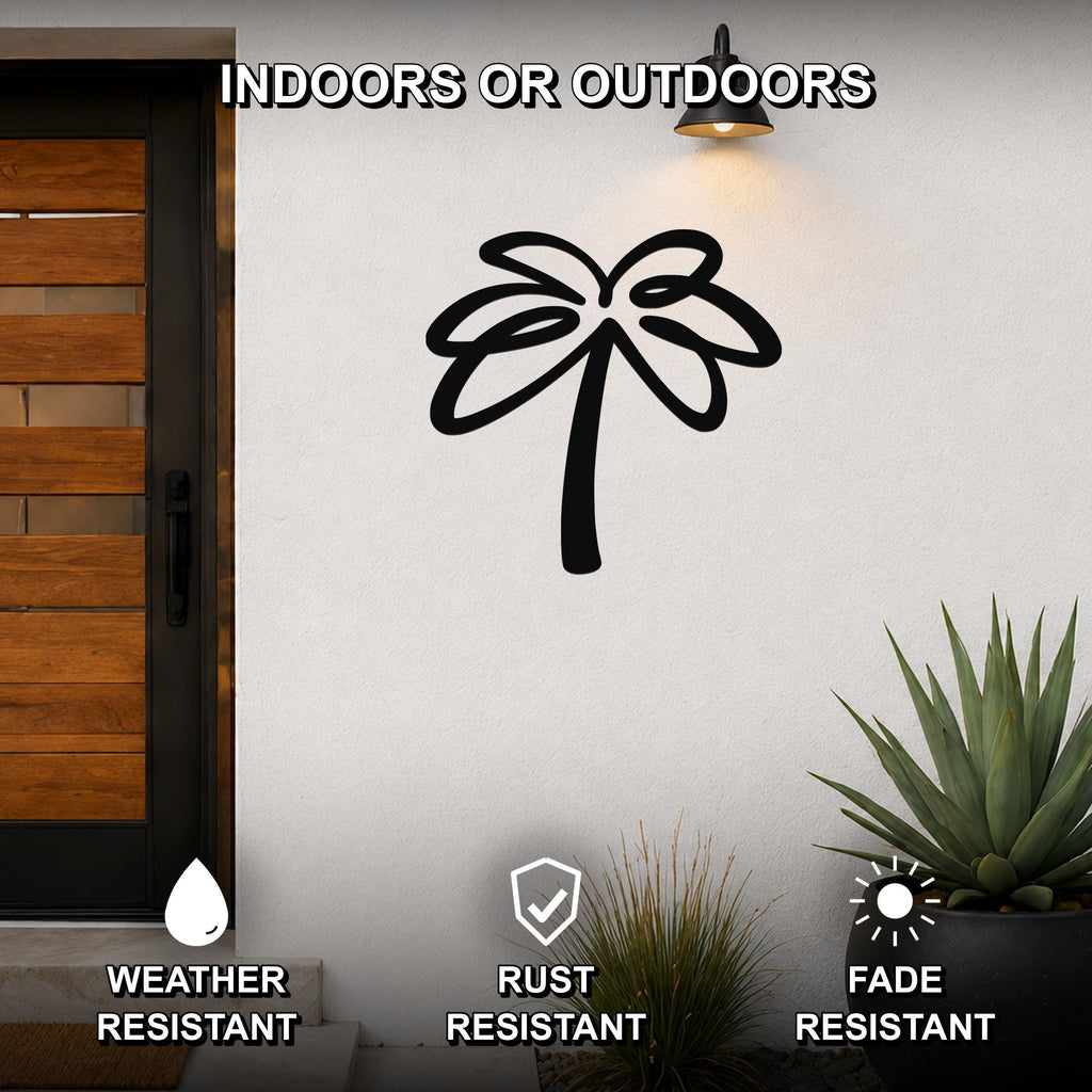 Black metal palm tree wall art with leaf cutouts, mounted on an outdoor wall beside a wooden door and potted plants.