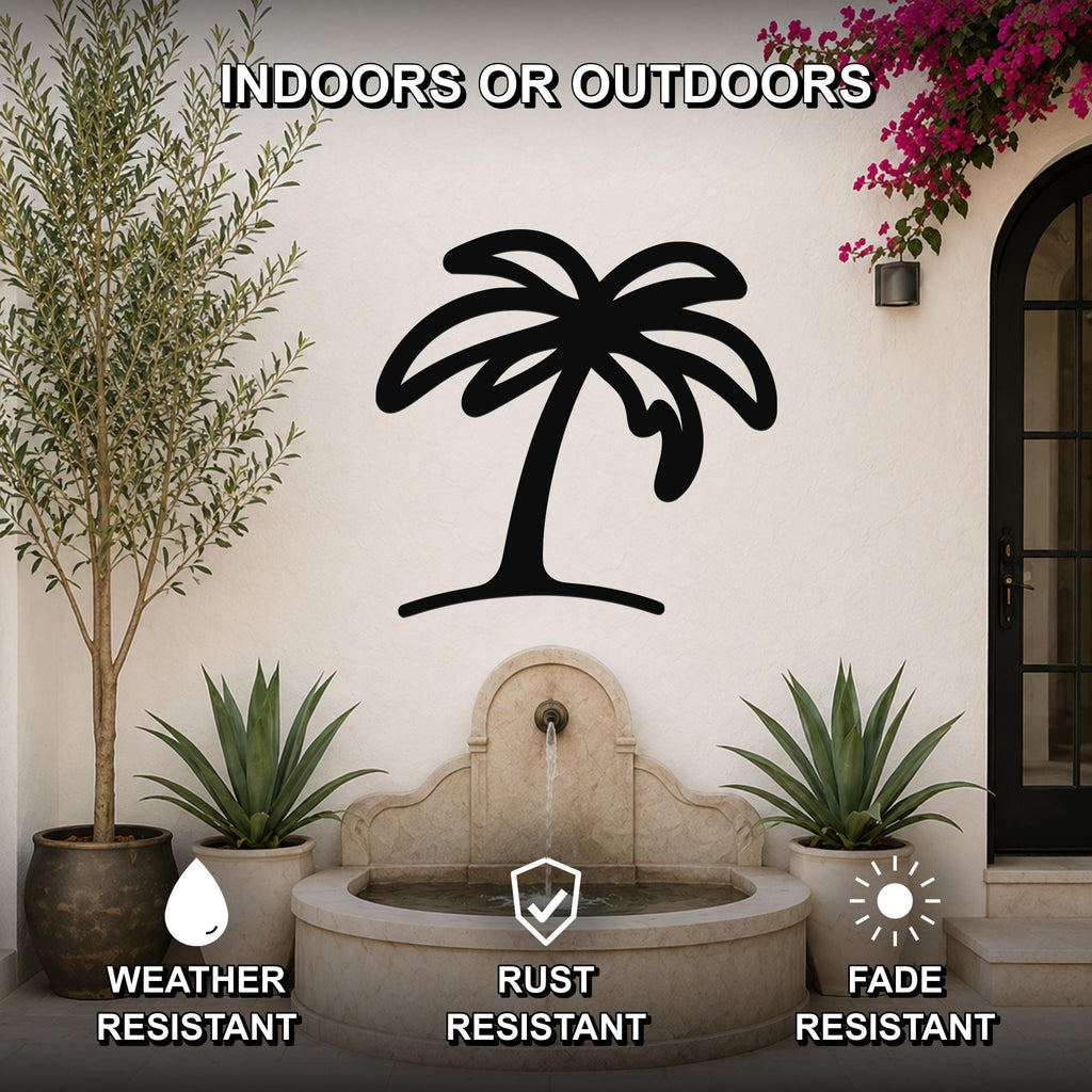 Black metal palm tree wall art with a silhouette design, mounted on an outdoor wall above a stone fountain, flanked by potted plants and a blooming vine.