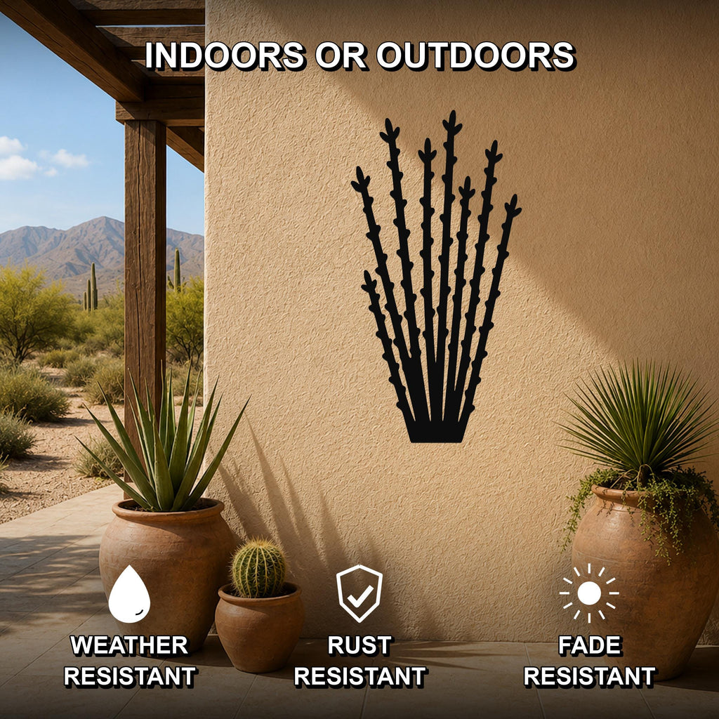 Black metal ocotillo wall art silhouette mounted on a beige outdoor wall, displayed on a patio with potted plants and desert scenery in the background.