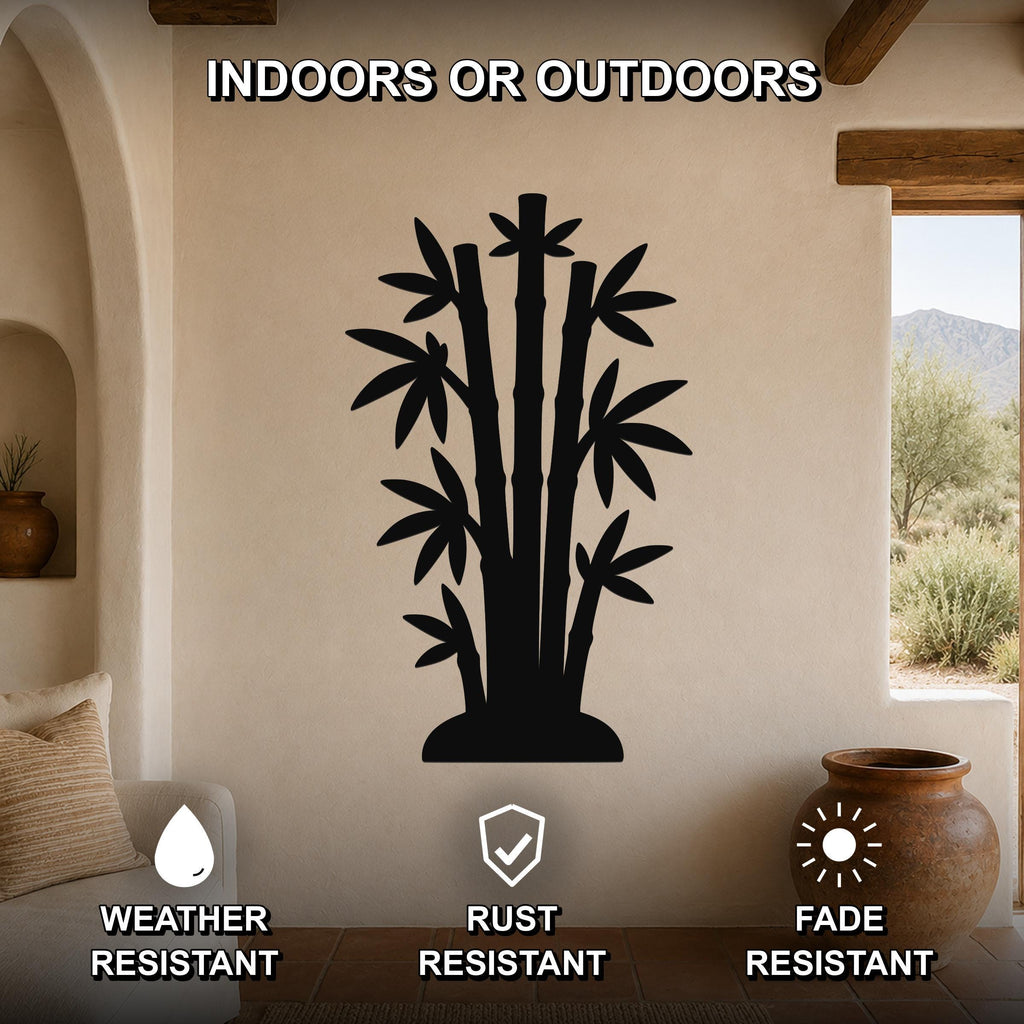Black metal bamboo wall art silhouette mounted on a beige wall in a living room, with text indicating it is weather, rust, and fade resistant for indoor or outdoor use.