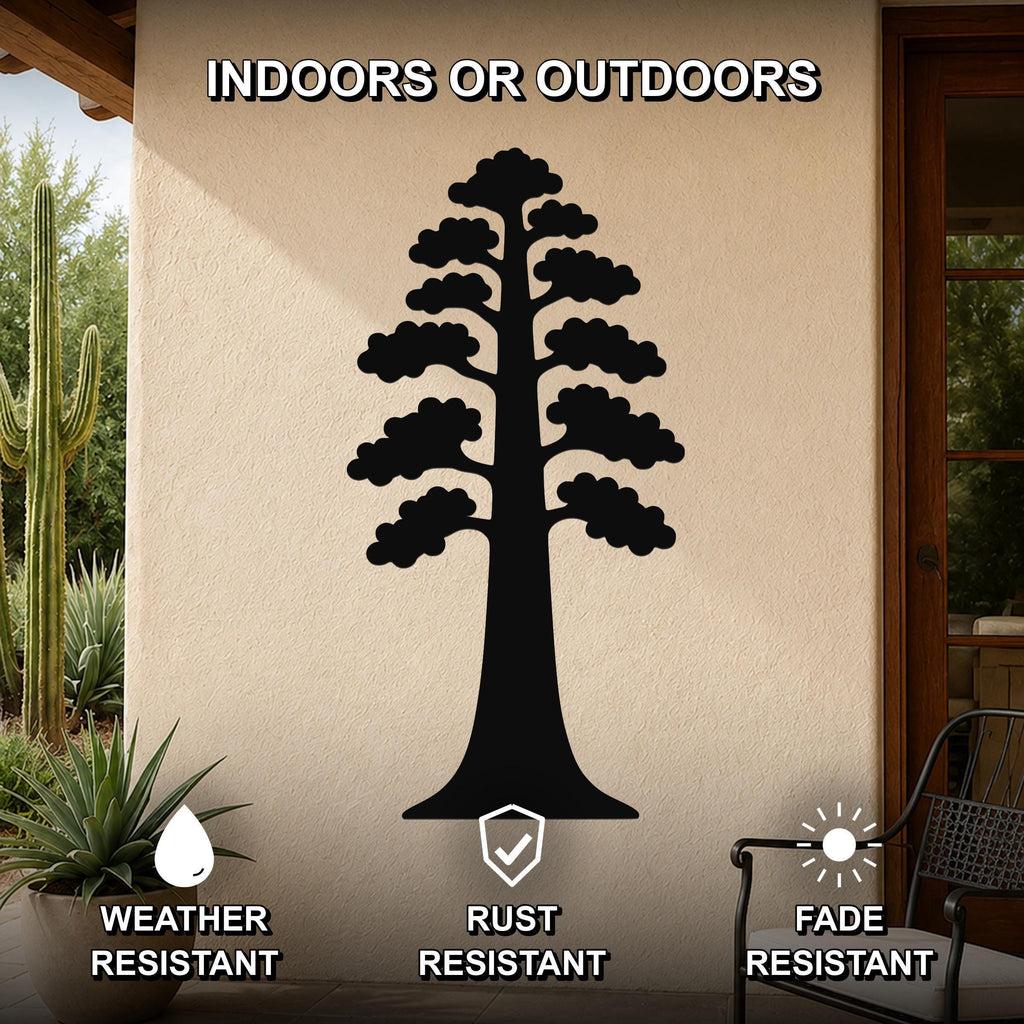Black metal sequoia tree wall art with layered branch cutouts, mounted on an outdoor patio wall above a potted succulent.