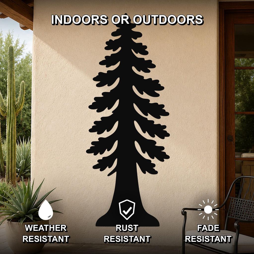 Black metal redwood tree wall art with layered branch cutouts, mounted on an outdoor patio wall beside a cactus and chair.