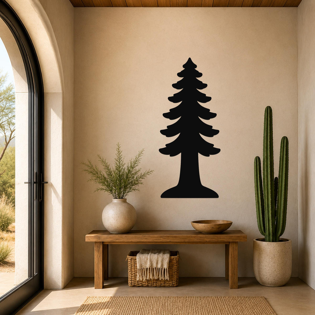 Black metal redwood tree wall art silhouette mounted on a beige wall above a wooden bench in a sunlit entryway.