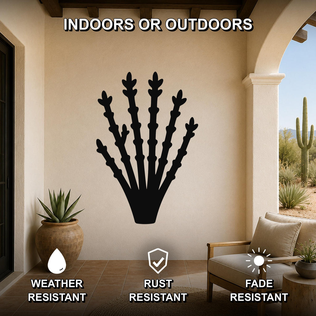 Black metal ocotillo wall art silhouette mounted on a beige patio wall, displayed above a wooden chair in a covered outdoor living space.
