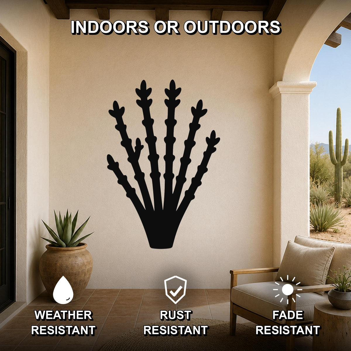 Black metal ocotillo wall art silhouette mounted on a beige patio wall, displayed above a wooden chair in a covered outdoor living space.