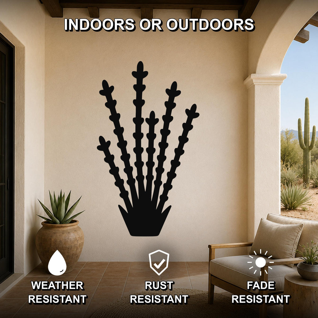 Black metal ocotillo wall art silhouette mounted on a beige patio wall, displayed above a wooden chair in a covered outdoor living space.