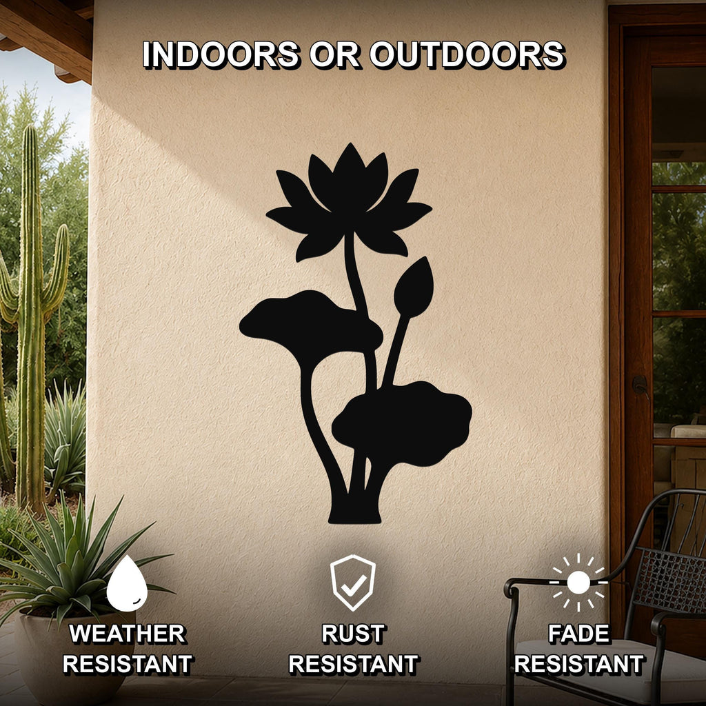 Black metal lotus water lily wall art with flower and leaf cutouts, mounted on an outdoor patio wall above a potted plant.