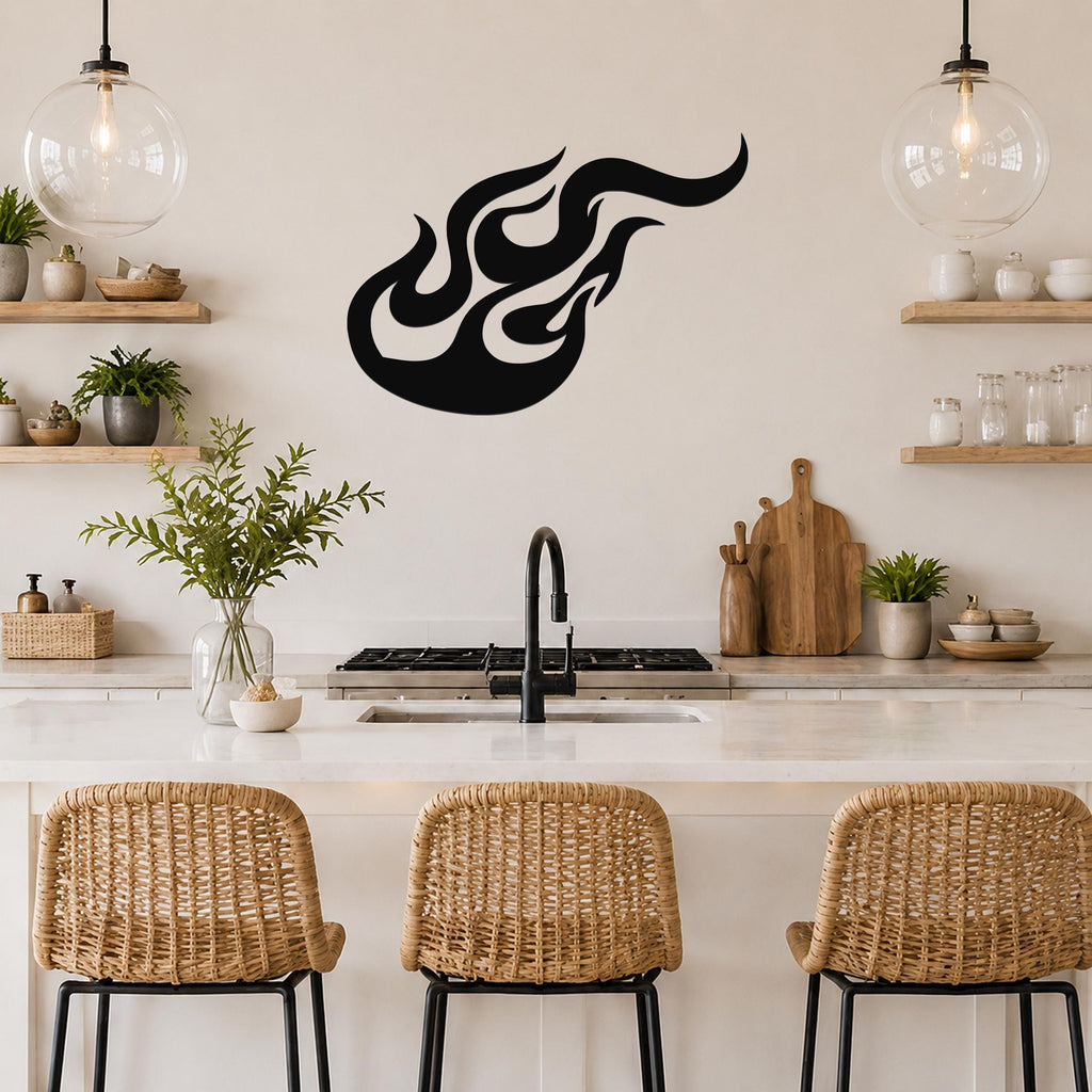 Black metal flame wall art with flowing silhouette cutouts, mounted above a kitchen counter.