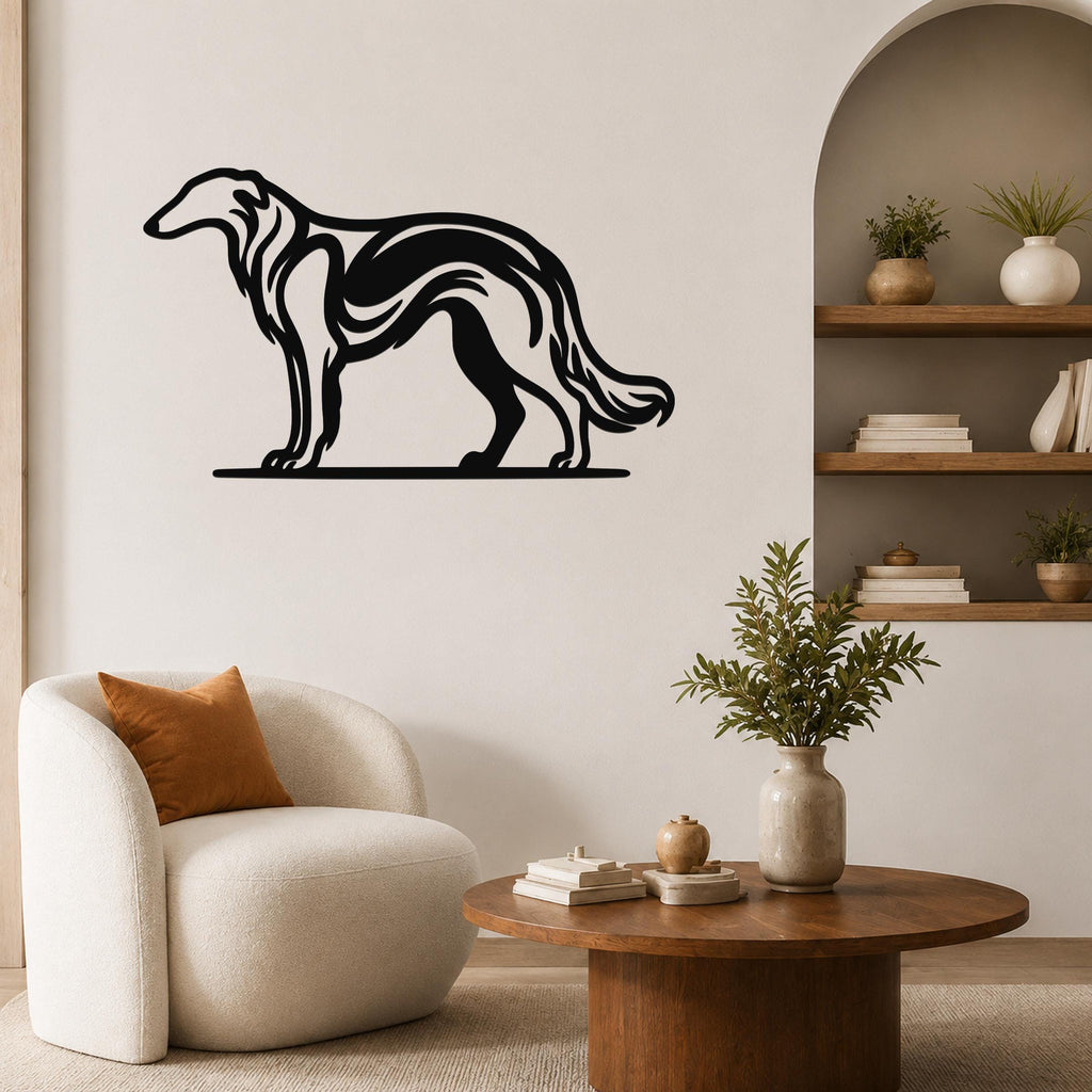 Black metal Borzoi dog wall art with flowing internal cutouts, mounted on a living room wall above a white armchair.