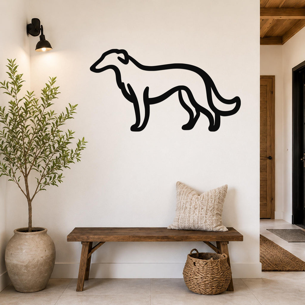Black metal Borzoi dog wall art silhouette mounted on a white wall above a wooden bench in a hallway.